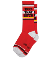 Red crew socks with white and black stripes featuring bold text 100% that bitch across the top section