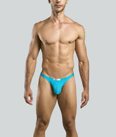 Bright turquoise justin and simon classic tanga athletic briefs with sleek form-fitting design and white waistband tag