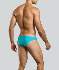 Turquoise swim trunks with sleek form-fitting design from justin + simon classic mens bikini collection