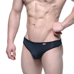 Black mesh briefs with a red and white logo on the waistband from MetroMaleWear Aragon Thong Black 1152-20