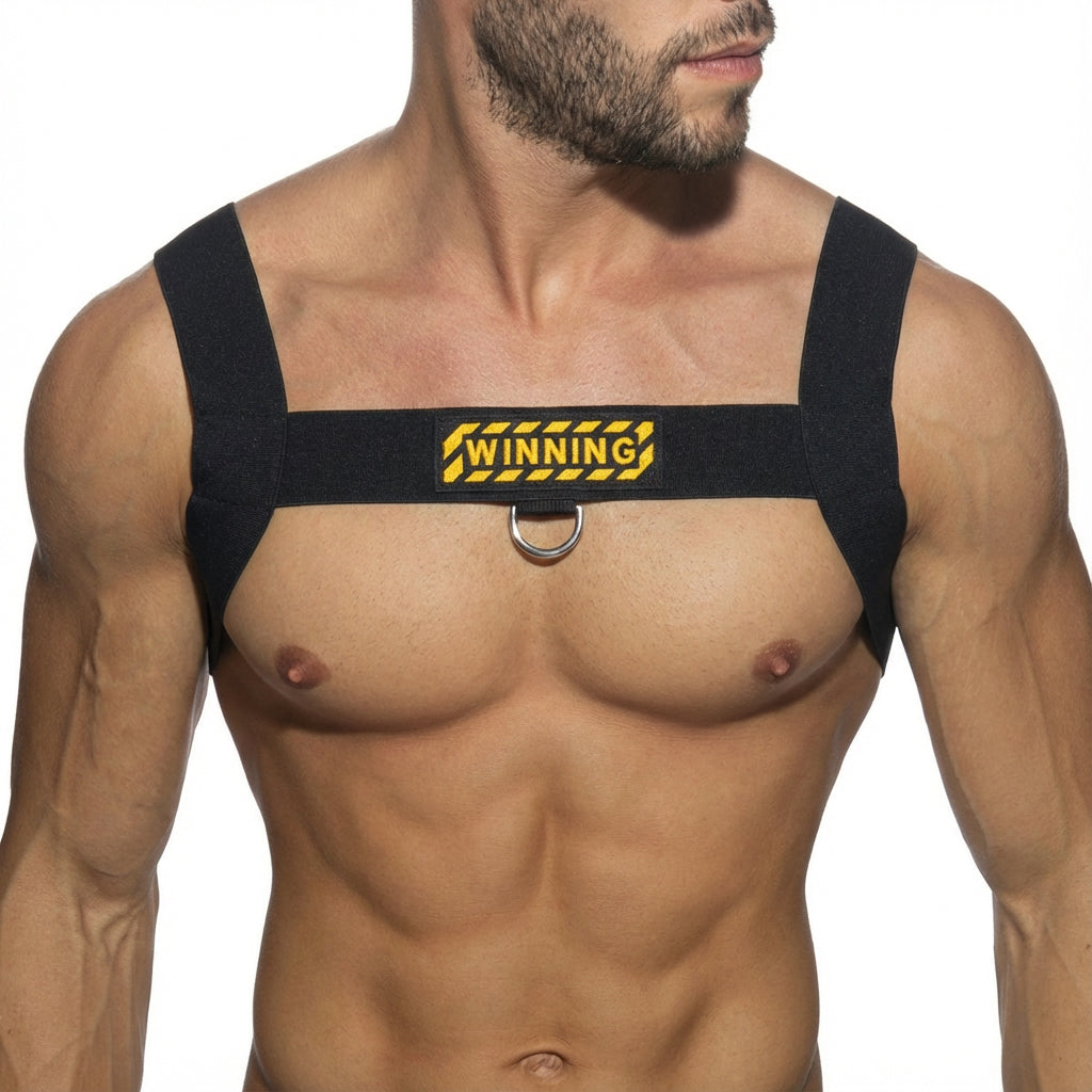 MetroMaleWear WINNING harness black fabric shoulder harness with yellow black winning logo patch and central silver ring