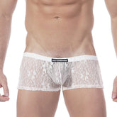 White lace men’s briefs with a black metro male wear brand label on the waistband in enhancement boxer lace nude 2043-71
