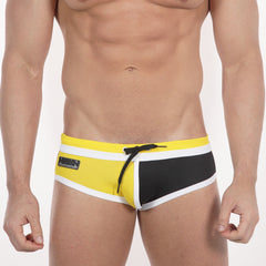 Bright yellow and black metro malewear double band swim brief with white trim and branded side logo for swimming