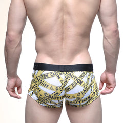 MetroMaleWear caution trunk white 2026-69 men’s briefs with white and yellow caution tape pattern and black waistband