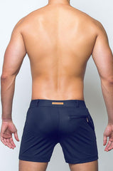 Navy blue bondi short athletic shorts with subtle textured fabric and small brown leather patch on waistband