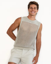 A smiling male model wearing the 2EROS Miami Knit Tank in grey against a plain white background.