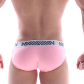 Metro male wear bulge hip brief pastel pink with white elastic waistband and gray mission logo in stylized lettering