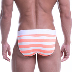 Coral and white striped ribbed briefs from metromalewear designed as neon orange bikini underwear for men