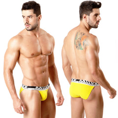 Bright yellow MetroMaleWear Asian bikini briefs with a black and white branded waistband for athletic use