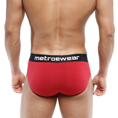 Red metrowear cotton hip briefs in terracotta with black waistband and white lettering for comfortable daily wear