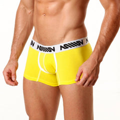 Bright yellow metro malewear cotton short boxer briefs with 7 inch inseam and white waistband with black lettering