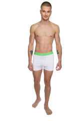 White calvin klein boxer briefs with a bright green waistband designed for performance yoga in arctic white color