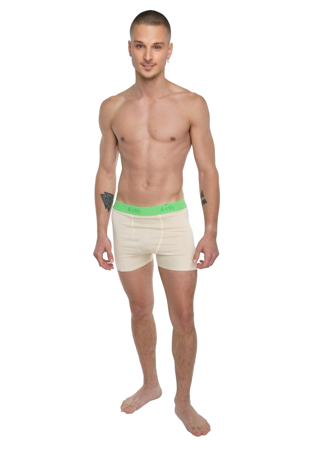 Performance yoga leggings short sand beige with cream-colored boxer briefs and bright green elastic waistband shown