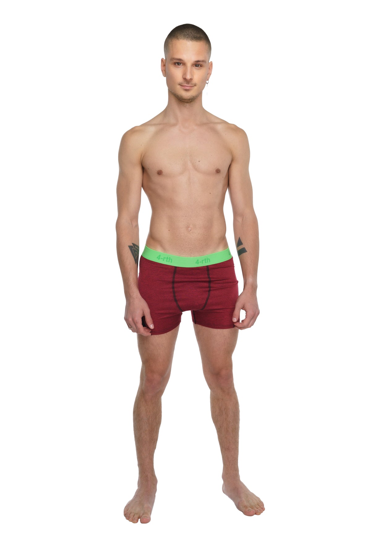 Performance yoga leggings short in brick red heather with a bright green elastic waistband shown from the front