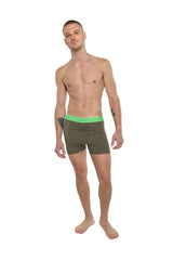 Olive green boxer briefs with bright neon green waistband designed for performance yoga and active wear