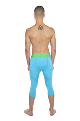 Performance yoga leggings 3/4 in bright blue form-fitting fabric with neon green waistband for active wear