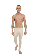 Cream-colored performance yoga leggings with a bright green waistband featuring jordi branding in sand beige color