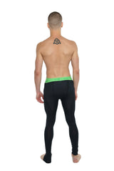 Black compression performance yoga leggings with bright green waistband designed for long workouts