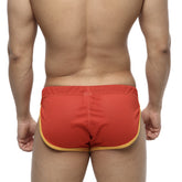 Red mesh athletic briefs with yellow trim from metromalewear soccer split short red 4705-12 for sports use