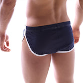Navy blue mesh athletic briefs with white perforated trim from metromalewear soccer split short series