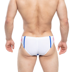 White swim trunks with blue and red side stripes by MetroMaleWear California for royal bikini style use