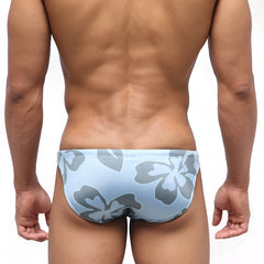 Light blue MetroMaleWear classic swim bikini with bold gray hibiscus flower pattern for beachwear