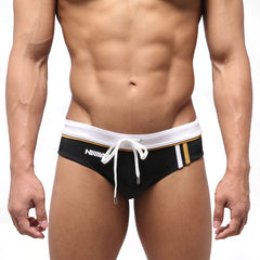 MetroMaleWear edge swim brief black with white waistband gold trim and white drawstring for swimming and beachwear