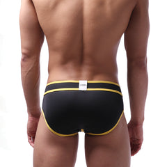 Black briefs with bold yellow trim and white metroMalewear brand tag at waistband swim brief style