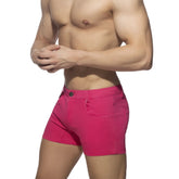 Vibrant fuchsia 5 pockets summer shorts made of durable denim fabric with classic five-pocket design and button closure
