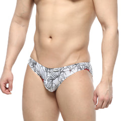 White swim trunks from MetroMaleWear with black floral patterns and red accents designed for active wear