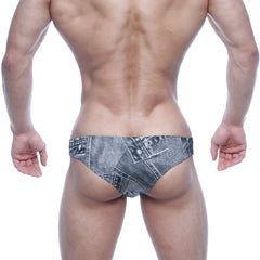 Denim-patterned swim trunks in faded blue-gray wash with stitched seams and button details metro malewear capri bikini