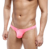 A vibrant pink form-fitting thong made of smooth elastic fabric with a small brand logo on the waistband