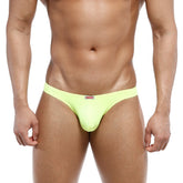 MetroMaleWear bulge capri bikini briefs in bright lime green seamless fabric with a red and white brand tag