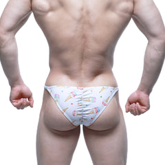 White swim trunks by MetroMaleWear featuring a playful colorful ice cream cone and sprinkle pattern