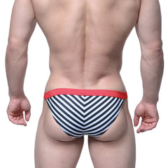 MetroMaleWear Caramelo Bikini black swim trunks with black and white chevron stripes and red elastic waistband