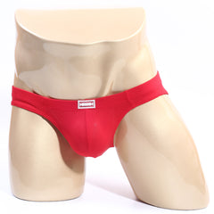Red men’s briefs metro malewear bravo bikini with small rectangular brand tag on waistband in vibrant red
