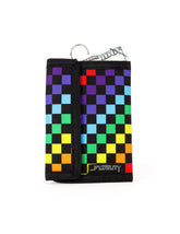 A vibrant rainbow-colored checkered 80’s velcro wallet with black border and metal ring for easy carrying