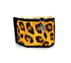 A vibrant yellow and black leopard print 80s velcro wallet with sleek black border and front keychain attached