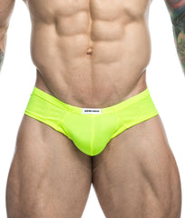 Bright neon green briefs with white waistband featuring justin simon label from the Justin plus Simon cheek collection