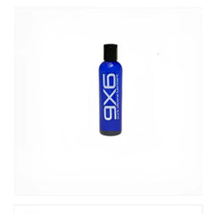 Blue axe body wash bottle with black cap and white lettering labeled 9x6 lube for moisturizing skin care