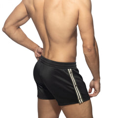 Black nexus button shorts featuring white and gray striped side panels designed for athletic use
