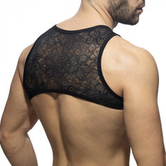 Black lace mesh backless flowery lace harness top with intricate geometric and floral patterns on the back side