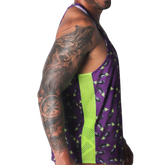 Aubergine-print tank top in purple with lime green mesh side panels and a racerback style.