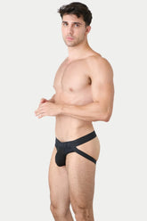 AWRY Black Menswear Lift Jock Thong Underwear modeled on a fit man in profile.