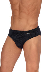 A man models Olaf Benz black beach brief swimwear with a dark zebra pattern and a small logo tag.