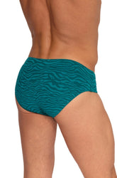 Rear view of a man wearing emerald Olaf Benz swim briefs with a wavy zebra pattern against a white background.