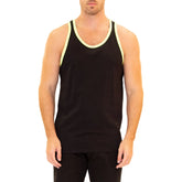 A man wearing a black Bespoke Moda Essential Ringer Tank with neon yellow trim.