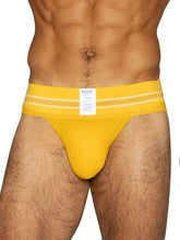 Bright yellow bike athletic briefs with white stripes and a branded label designed for sports use