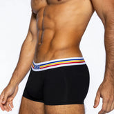 Muscular man wearing BIKE Athletic black cotton trunk underwear with a white, blue, and red striped waistband.