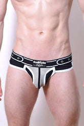 Black and white mesh briefs with a bold modern design and asssticks logo on the waistband comicaze brief